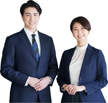 スーツを着た男女